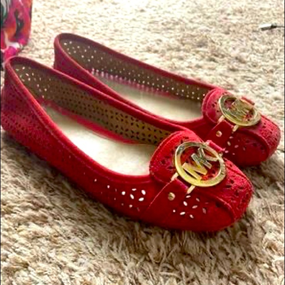 Red MK flats. Only worn one time. Size 8.